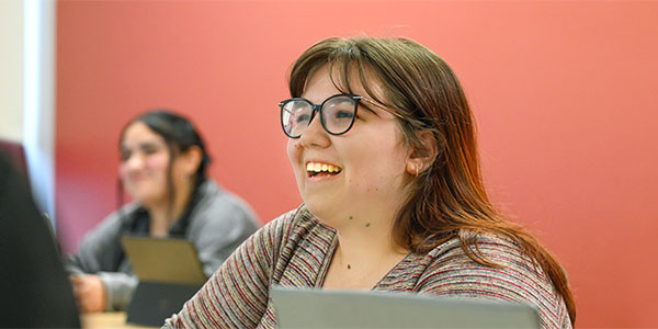 Female student in classroom.
