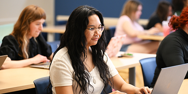 Social student in classroom.