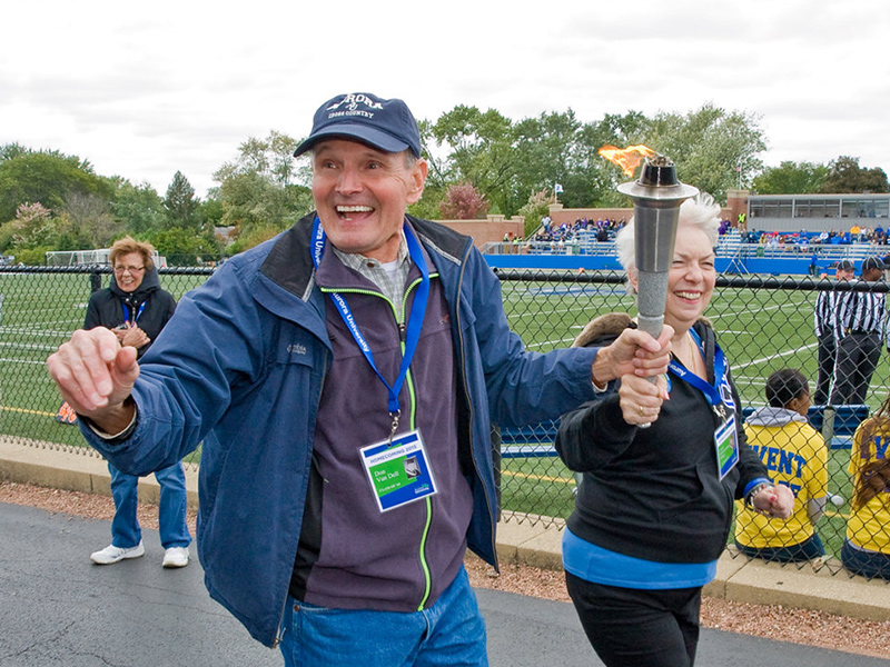 Alumni carrying the torch.