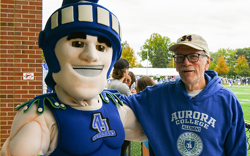 Sammy Spartan with a homecoming guest.