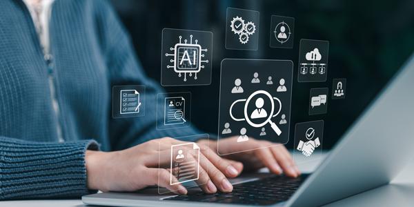 person working on laptop using AI for job search