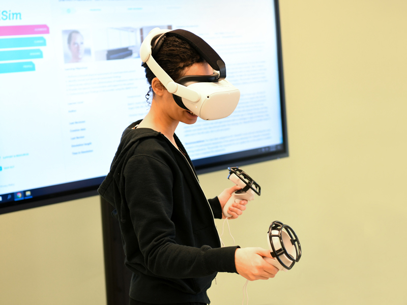 students using virtual reality headset