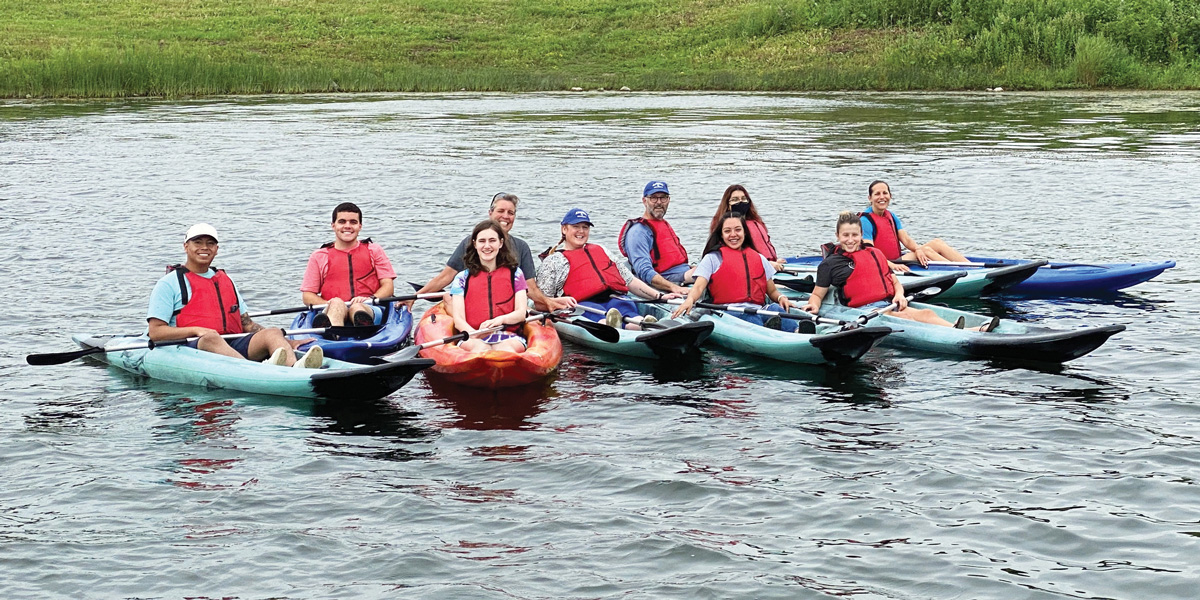 Students in kayaks.