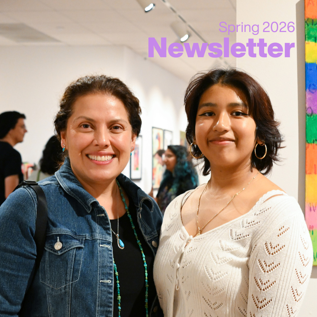 Student with President Rivera-Mills in the Schingoethe Center.