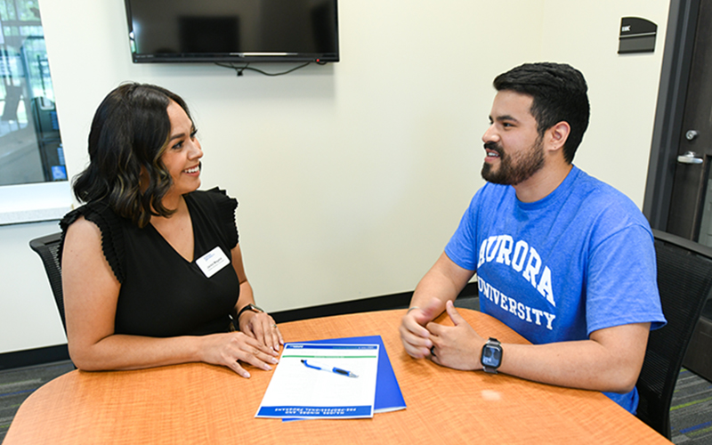student and mentor talking
