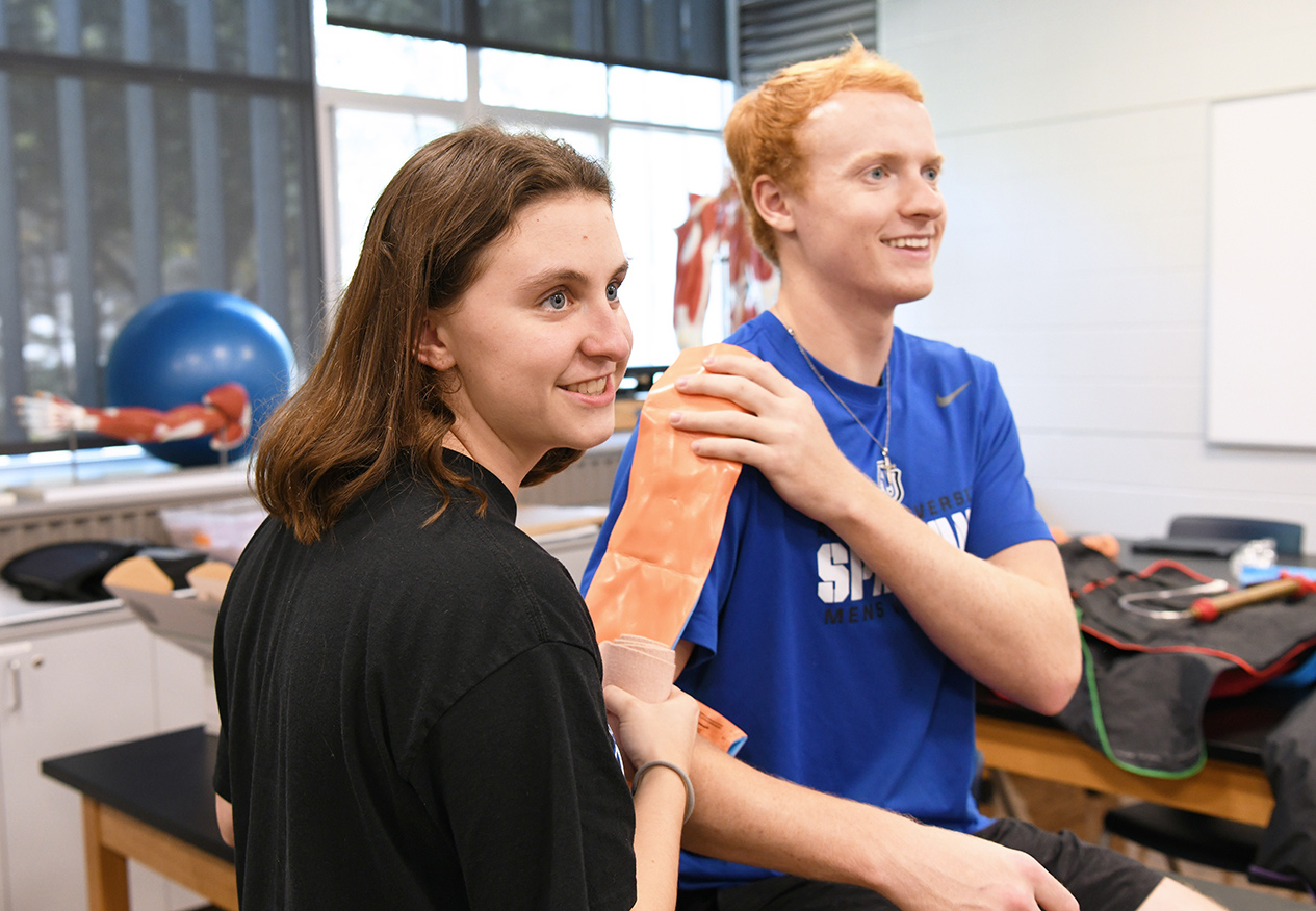 athletic training students practicing skills
