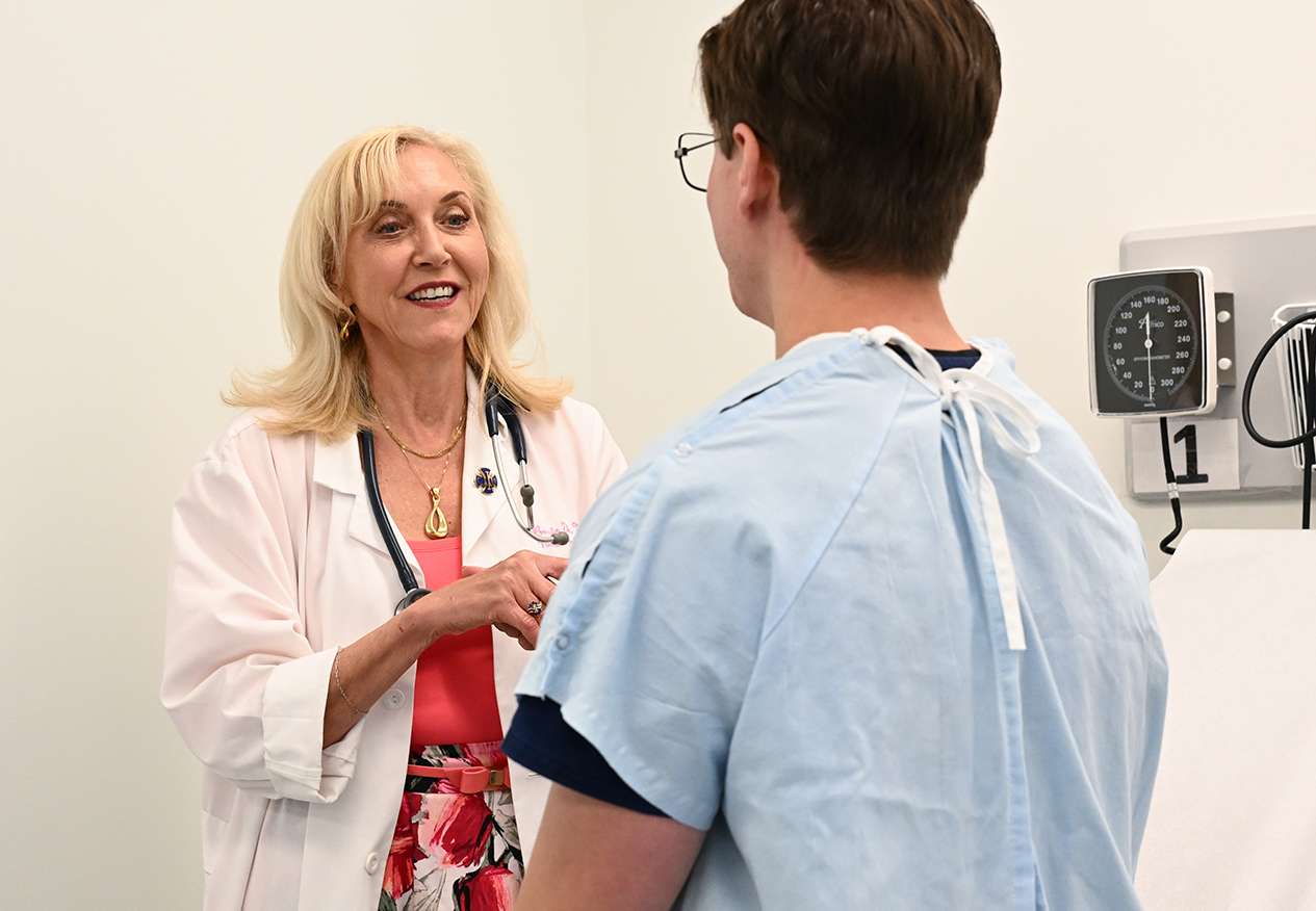 nurse practitioner talking to patient